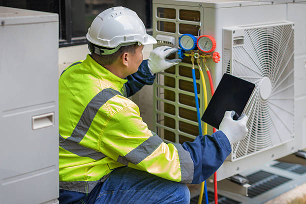 Professional Heat Pump Repair technician working in Litchfield, MI